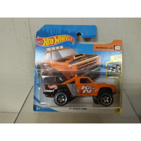 DODGE D-100 1987 ORANGE 6/10 SPEED GRAPHICS 1:64 HOT WHEELS