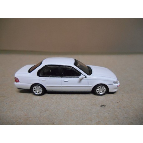 TOYOTA COROLLA AE100 1996 WHITE LHD 1:64 BM CREATIONS